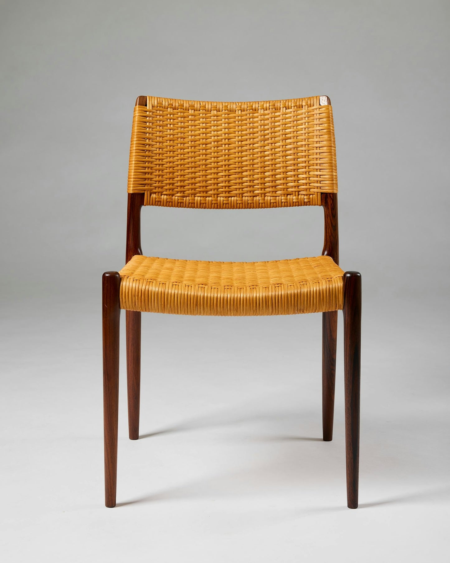 Set of fourteen dining chairs