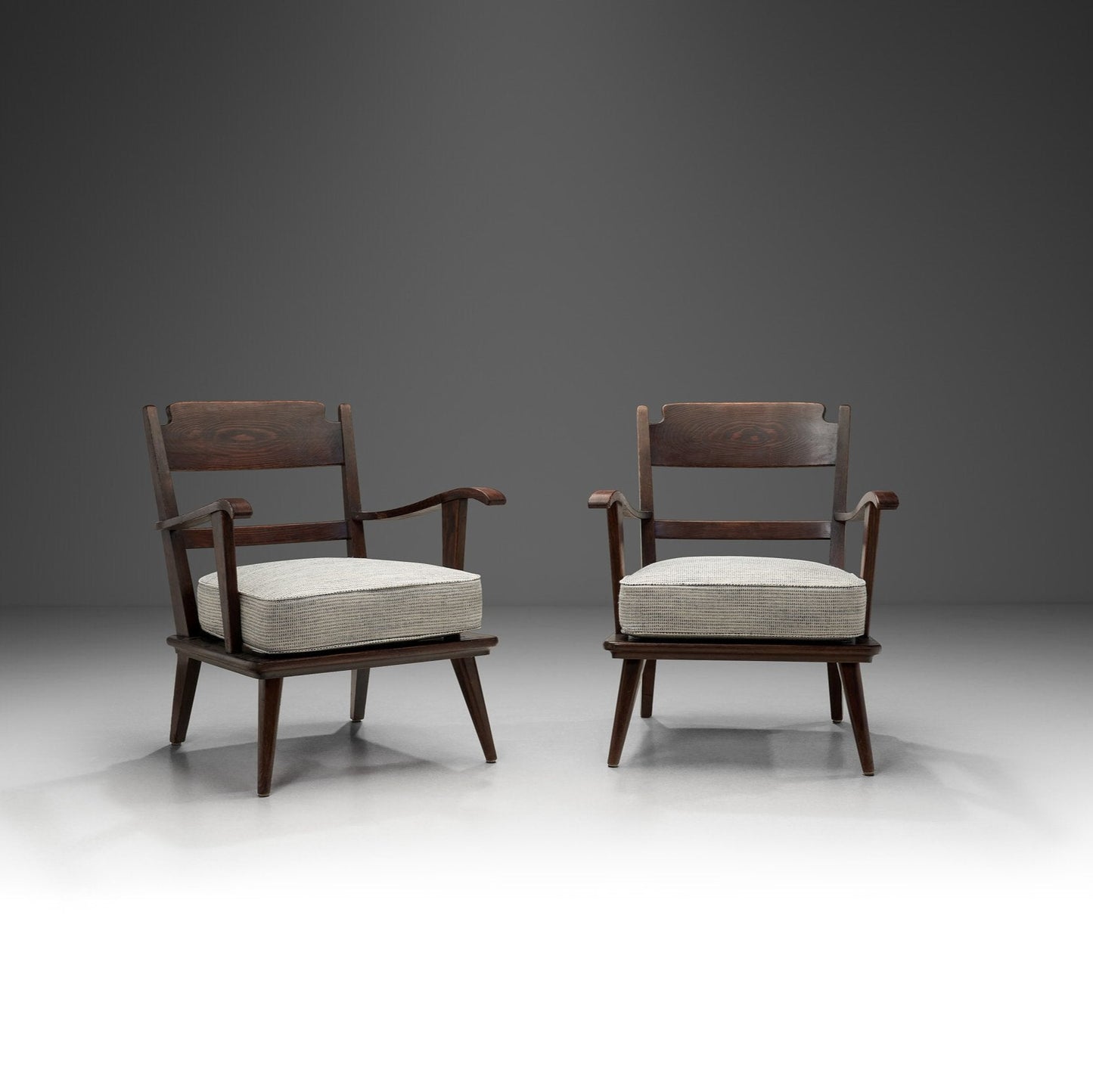 Pair of Dark Stained Pine Armchairs, Europe First half of the 20th century