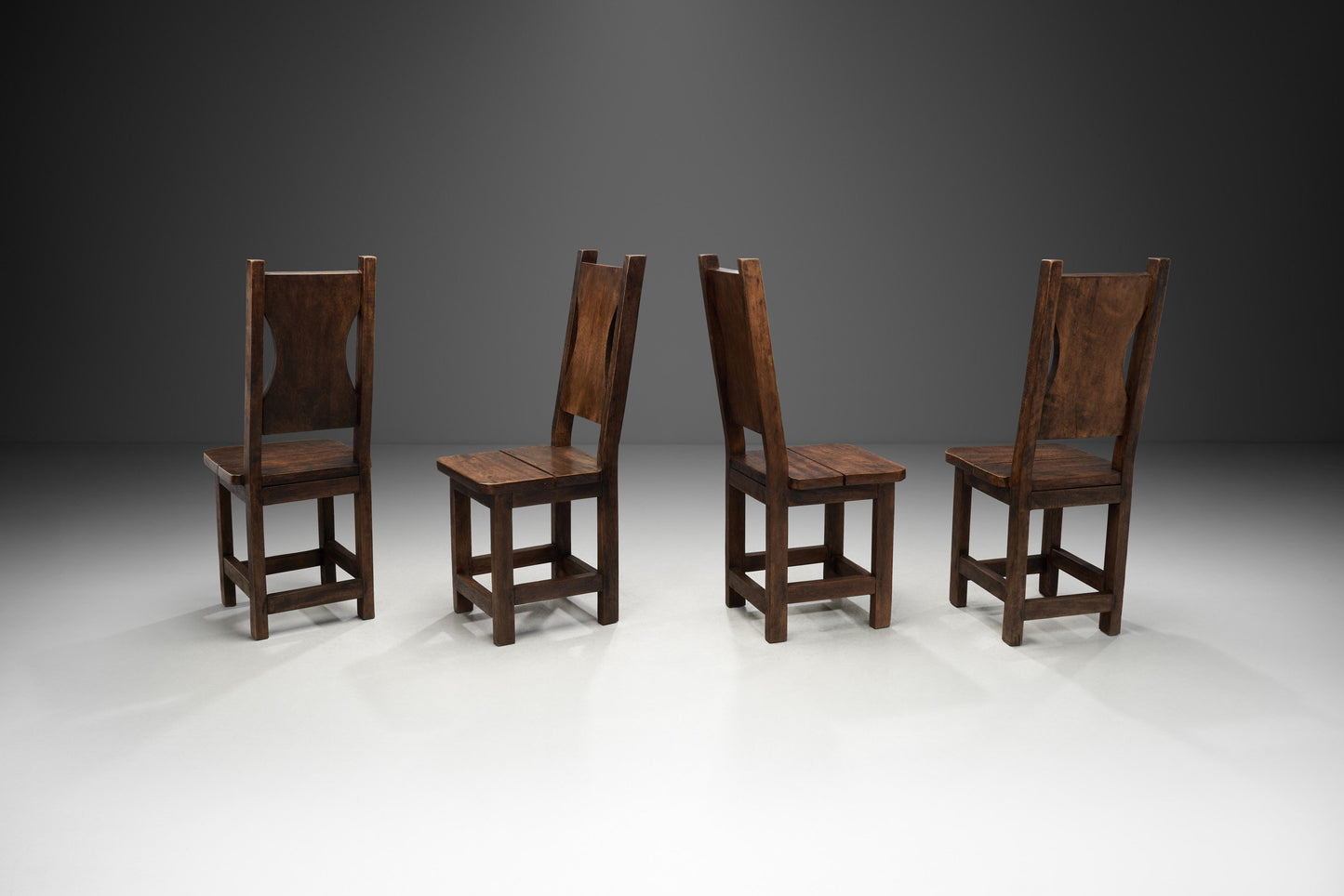 A Set of Four Stained Beech Modernist Dining Chairs, France 1950s