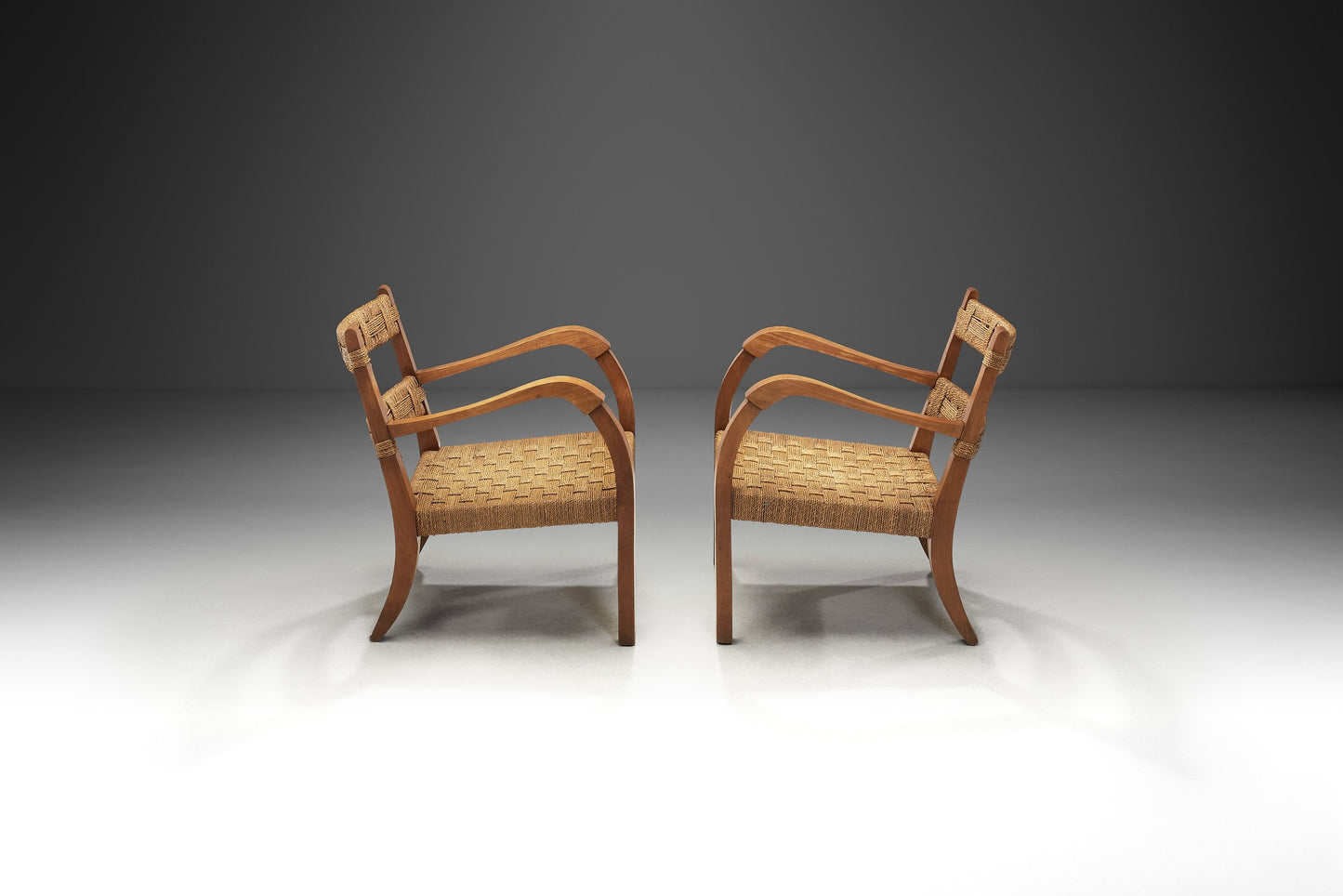 A Pair of Wood and Rattan Armchairs, Italy Mid-20th Century