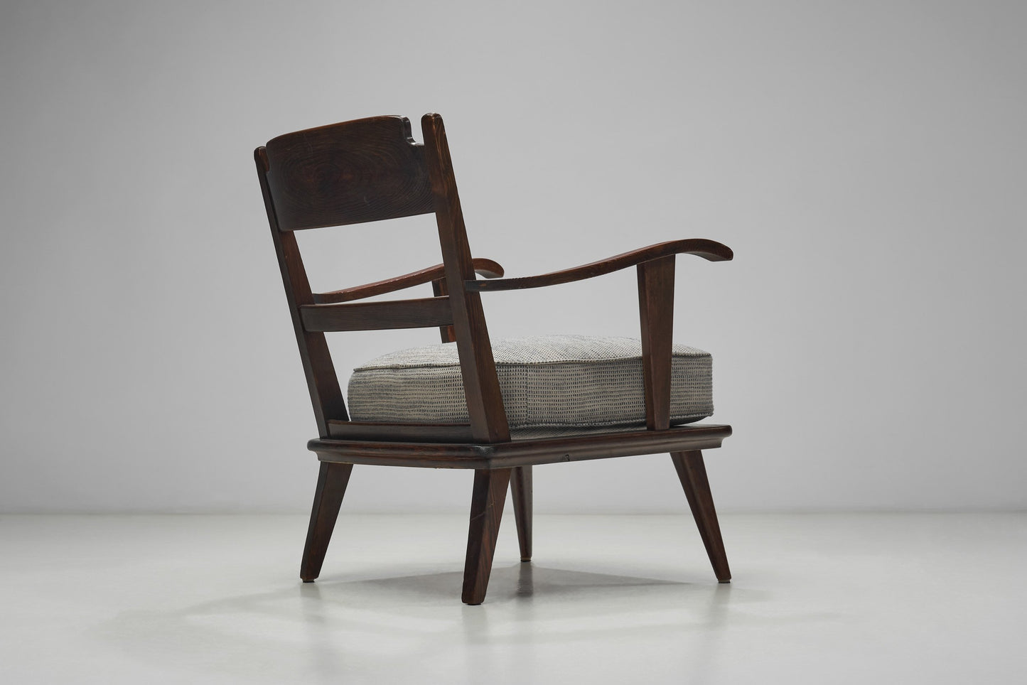 Pair of Dark Stained Pine Armchairs, Europe First half of the 20th century
