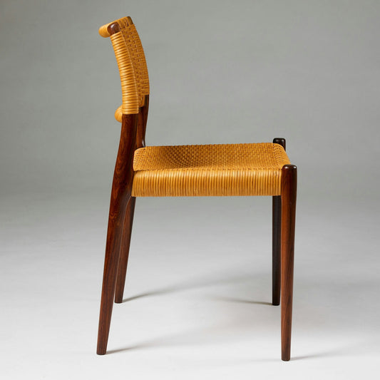 Set of fourteen dining chairs
