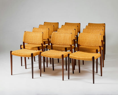 Set of fourteen dining chairs