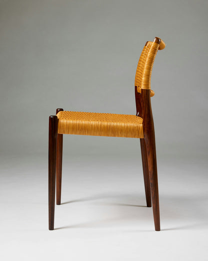 Set of fourteen dining chairs