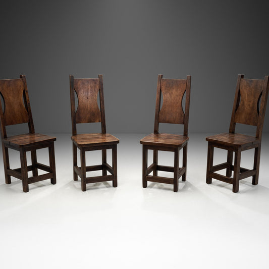 A Set of Four Stained Beech Modernist Dining Chairs, France 1950s