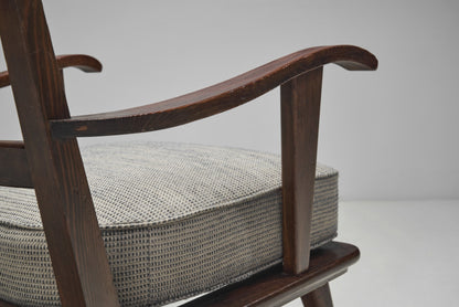 Pair of Dark Stained Pine Armchairs, Europe First half of the 20th century