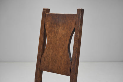 A Set of Four Stained Beech Modernist Dining Chairs, France 1950s